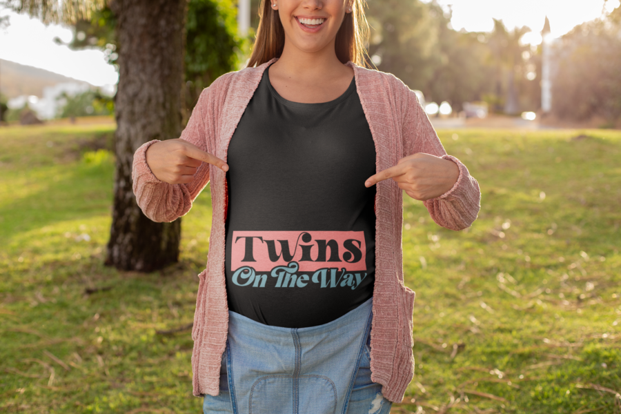 mockup of a happy pregnant woman pointing at her t shirt 26671 - Dheeth By Nature